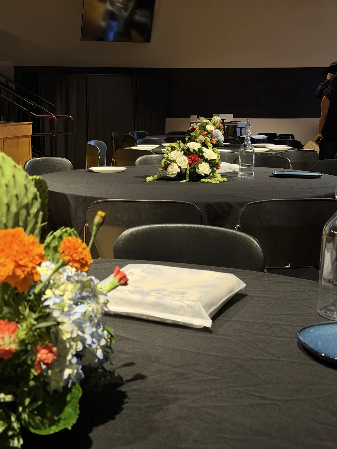 Low centerpieces across the event hall tables